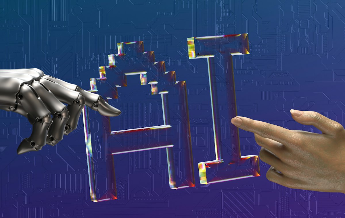 Une main humaine et une main robotique se tendent vers le mot AI